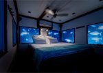 Manta resort Underwater room: Underwater room by night