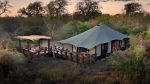 andBeyond Ngala Tented Camp: south-africa-ngala-tented-camp-tented-suite-exterior-with-outside-deck-website-1920×1080-fill-gravityauto-q_autobest